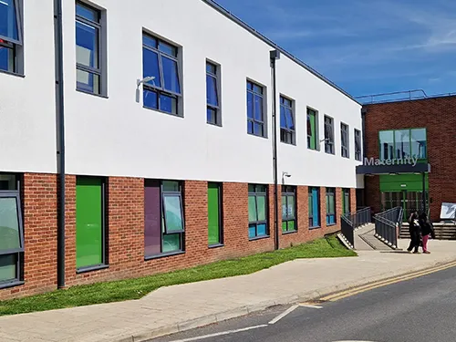 Hospital with green windows