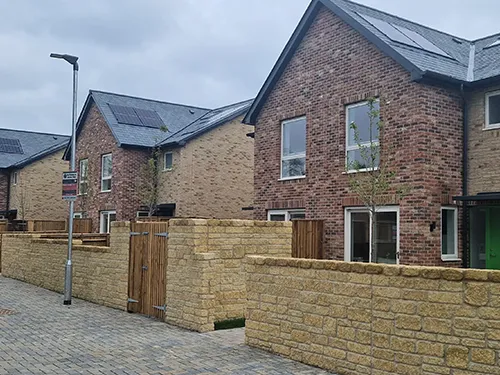 street view of houses with cream wall